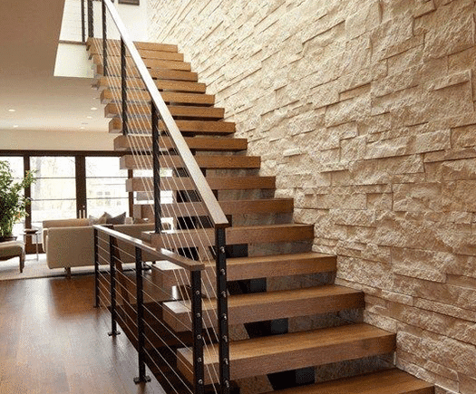 Escada metálica espinha de peixe com design exclusivo em ambiente sofisticado - a arte em aço da HBFER Estruturas Metálicas